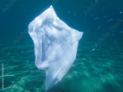 Bag in underwater, Environmental pollution problem plastic bottle in sea, Plastic rubbish garbage pollution in ocean, Plastic Bag floating underwater in Mediterranean sea, Plastic ocean pollution.