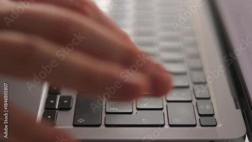Close-Up of Male Hands Typing on Keyboard