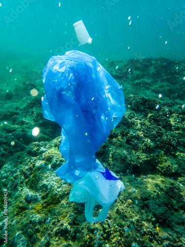 Bag in underwater, Environmental pollution problem plastic bottle in sea, Plastic rubbish garbage pollution in ocean, Plastic Bag floating underwater in Mediterranean sea, Plastic ocean pollution.