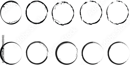 Set of black grunge ink circle frames and coffee ring stains on white background