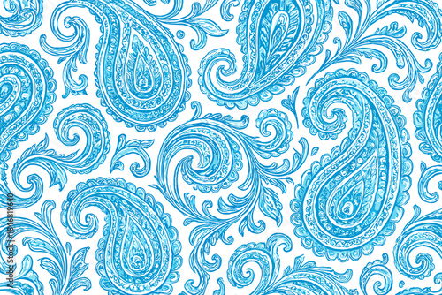 Decorative blue paisley design in repeating pattern on a white background with curls and swirls