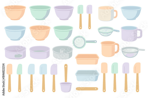 Various kitchen utensils and mixing bowls arranged on a light background for cooking and baking activities
