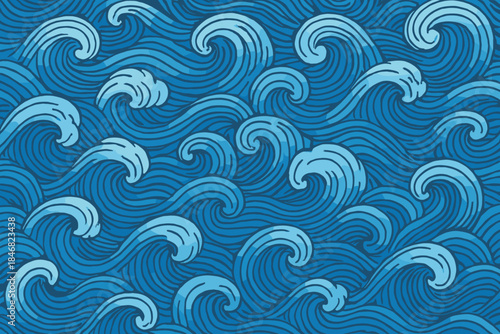 Waves move through a vast blue ocean showing patterns of ripples and swells on a clear sunny day
