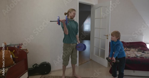 Man Does Exercise Workout with Kid at Home. 4K 10-bit