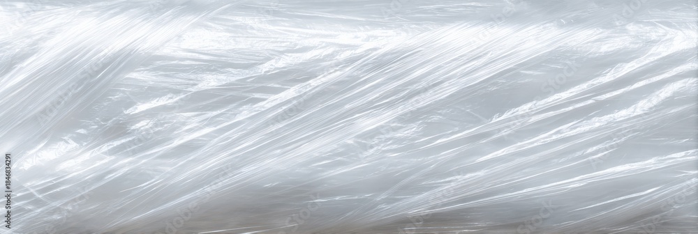 Obraz premium Close-up of transparent plastic wrapping with textured surface