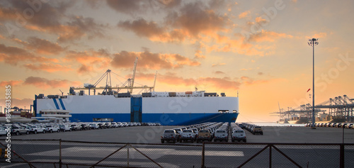 Canvas Print Close up vehicle carrier vessel loading car for shipping to worldwide, Large RoRo (Roll on off) vehicle car carrier, New car lined up in the port for import export around the world