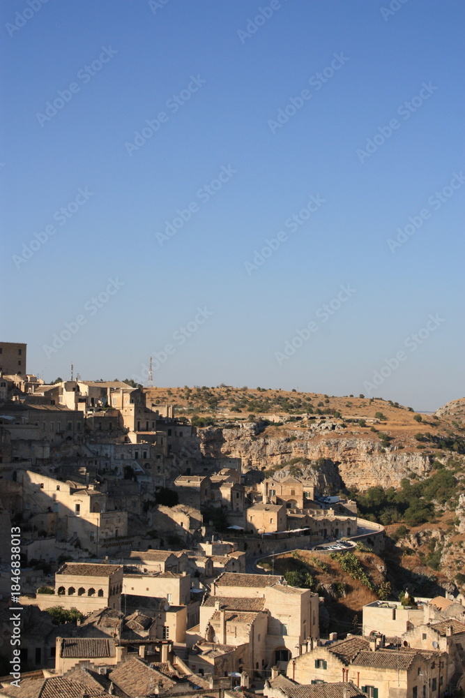 Obraz premium Matera, Italy - 12 August 2025: Matera historic cityscape and streets
