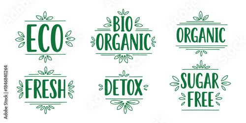 Set of hand-drawn green typographic labels promoting eco-friendly, organic, and bio products with leaf accents