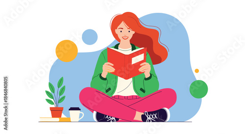 Young woman with flowing red hair enjoys reading a book while sitting cross-legged in a cozy and relaxed atmosphere with a plant and coffee.