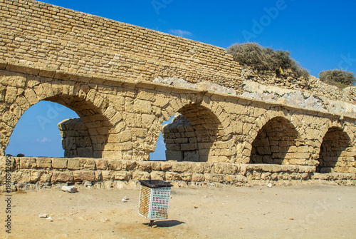 A section of the magnificent ancient Roman aquaduct, where it crosses the Mediterranean beach at Ceaserea Maritima in Israel