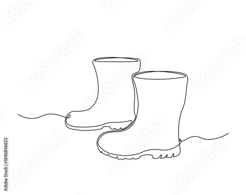 One continuous line drawing of farmer boots. Rubber boots outline drawing illustration.