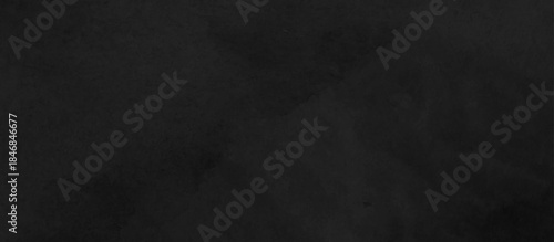 Grunge dark chalkboard and black board. Wall black paper cement distressed. abstract dark black wall texture. concrete rough dark floor old grunge backdrop. interior vintage smooth closeup background.