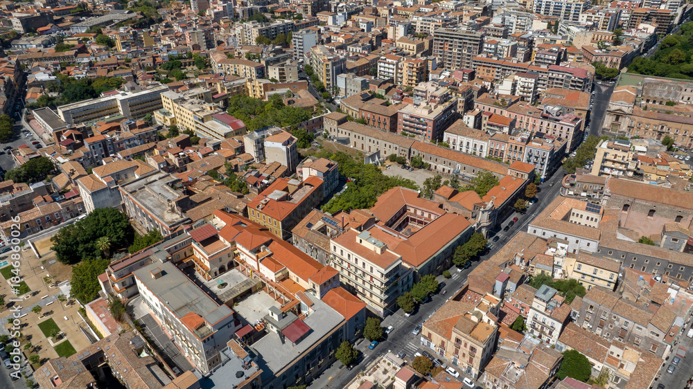 Fototapeta premium Aerial view of the city of Catania, Sicily, Italy. In the foreground is the former Church of Santa Maria della Purità.