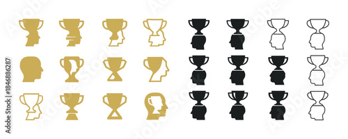 Gold, black, white trophy and face icons in profile view