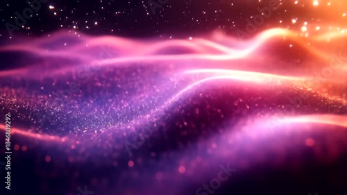 Abstract glowing particles and waves in vibrant colors.