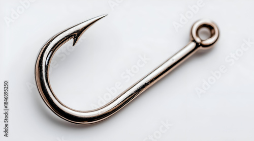 A close-up image of a shiny fishing hook, showcasing its sharpness and design for anglers and fishing enthusiasts.