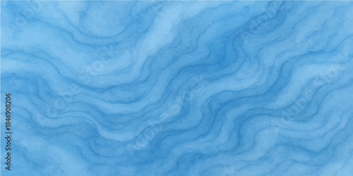 Abstract blue silk and water background with soft flowing waves of satin fabric creating a liquid ripple pattern and motion texture for an elegant nature art wallpaper backdrop