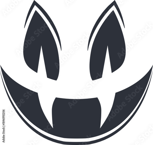 Scary monster face showing vampire fangs and eyes