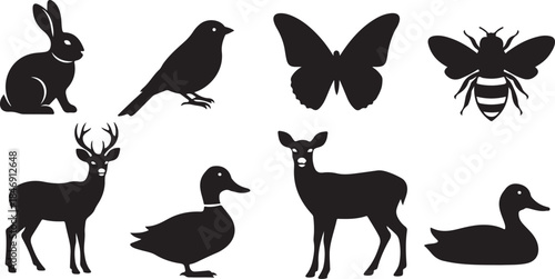 Eight black animal silhouettes on white background