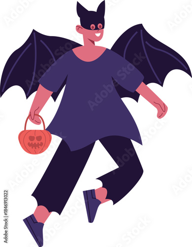 Person in bat costume celebrating Halloween with pumpkin bucket