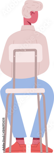 Person sitting on chair with back to viewer