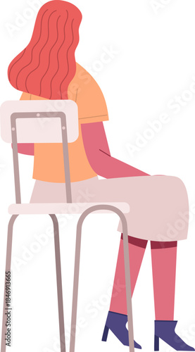 Woman with red hair sitting on chair