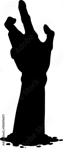 Zombie hand reaching from ground horror concept
