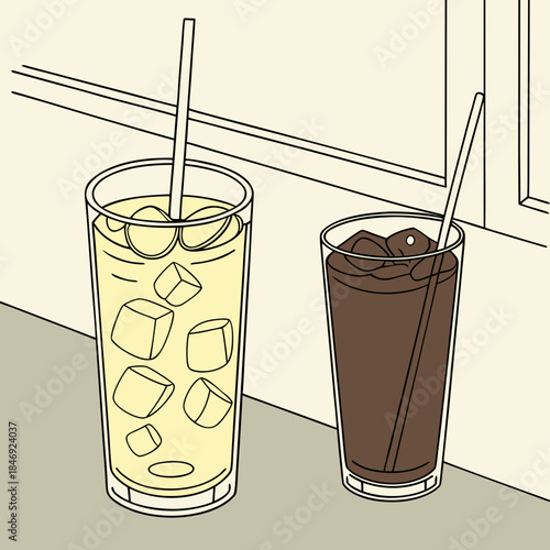 Two glasses of cold drinks with straws on a table