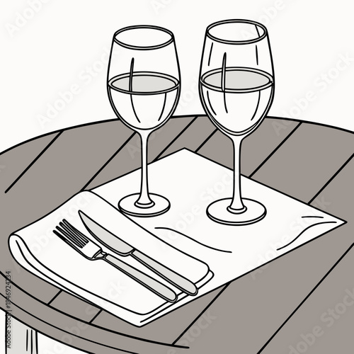 Wine glasses on table with napkin and cutlery fork
