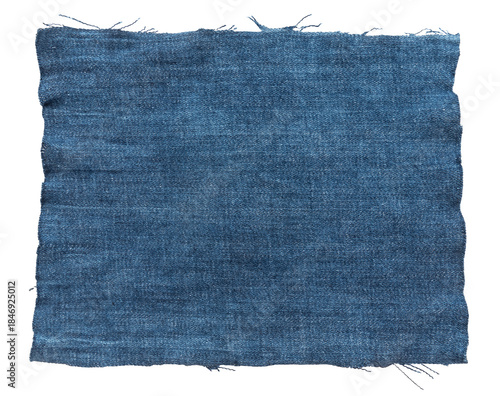 Piece of torn denim on a white background. Denim texture