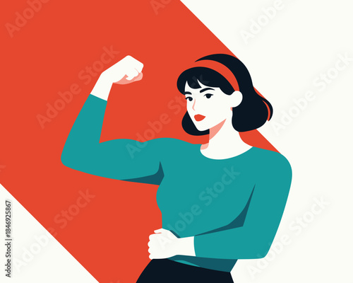 Strong woman flexing her arm in a powerful pose with confidence and determination