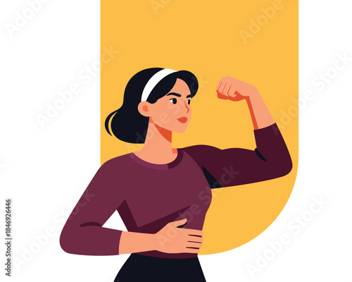 Confident woman flexing her arm muscles in a powerful pose on yellow