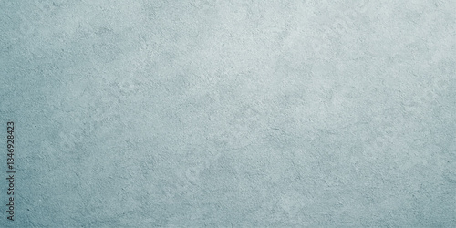 Seamless blue paper texture and abstract background pattern featuring a rough grunge surface with a vintage blank canvas design for an empty textured wallpaper backdrop