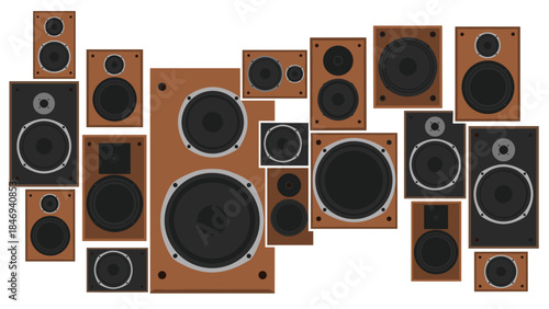 Collection of vintage stereo speakers in varying sizes and designs are arranged against a plain white background.