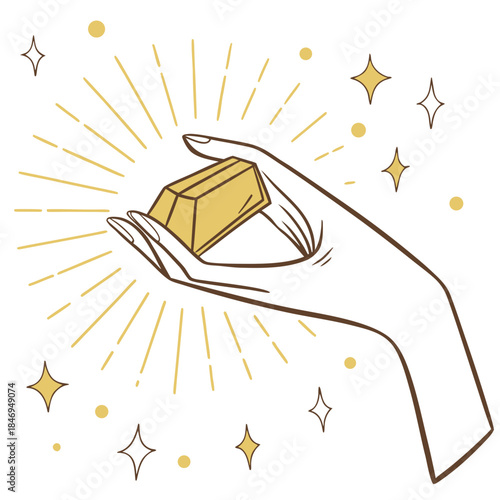 Hand holding gold nugget with sunburst and stars yellow