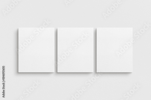 Canvas mockup 4:5. Set of three canvases. Gallery wall mockup, set of 3 canvases. Clean, modern, minimalist, bright. Portrait. Vertical.