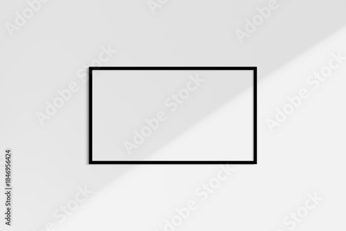 Horizontal frame mockup 16:9, 9:16 landscape. Single black frame mockup. Clean, modern, minimalist, bright. Shadow overlay.