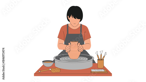 A person skillfully shapes a clay pot on a pottery wheel, demonstrating the art of ceramics and craftsmanship.