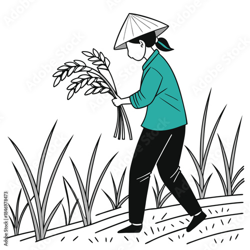 Woman wearing a conical hat walks through a field holding harvested wheat stalks