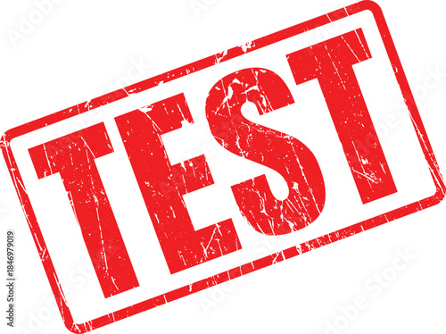 A bold red distressed rubber stamp distinctly features the word TEST on a bright, uncluttered white background