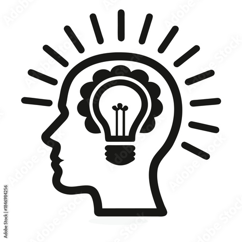 Silhouette of a head contains a light bulb, and radiates light rays