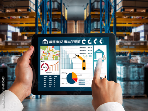 Foto Warehouse management innovative software in computer for real time monitoring of goods package delivery