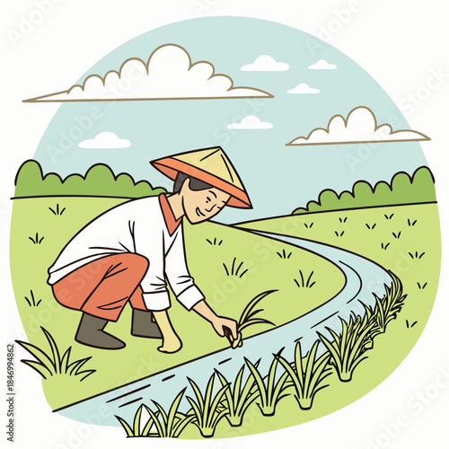 Smiling Asian farmer plants rice seedlings along a small stream in verdant field