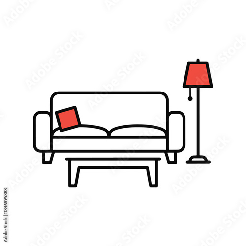 Red pillow on a bed with a bedside table and lamp