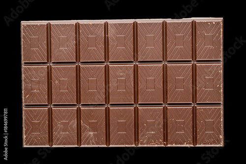 One bar of dark chocolate  on a black background, close-up, top view.