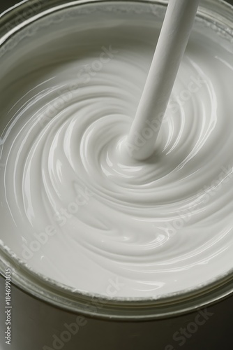 Wallpaper Mural White paint being stirred in a can Torontodigital.ca