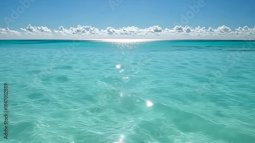 Turquoise water meets a bright blue sky
