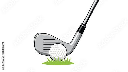 Golf club is poised to strike a white golf ball resting on a patch of green grass, illustrating the sport's precision.