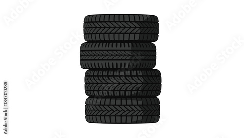 A neatly stacked pile of four black car tires suggests automotive maintenance or a tire shop inventory, ready for replacement or sale.