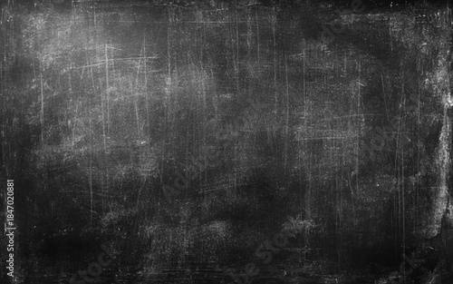 A chalkboard that's been erased quite a few times.